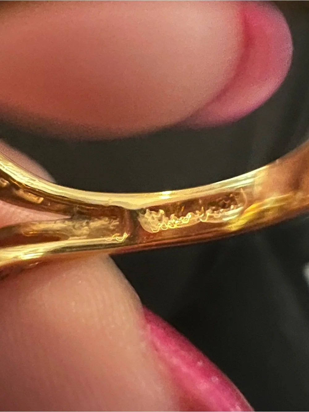 Gold Ring with Ruby-Red Center and Clear Accent Stones